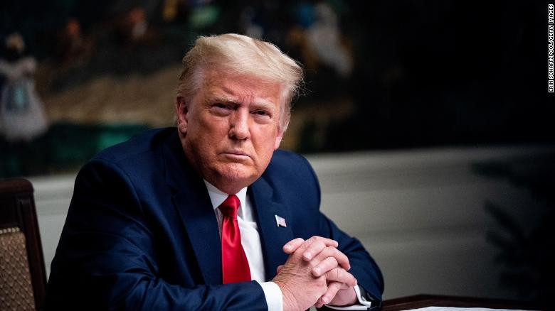 Donald Trump at desk