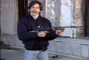 Geraldo with tommy gun