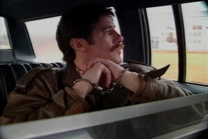 Geraldo in handcuffs